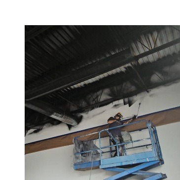 Spray Painting from Scissor Lift